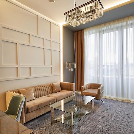 Aghababyan'S Hotel Yerevan Exterior photo A living room in a suite at the hotel